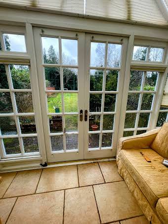 Front door floor restoration and conservatory doors.  album cover