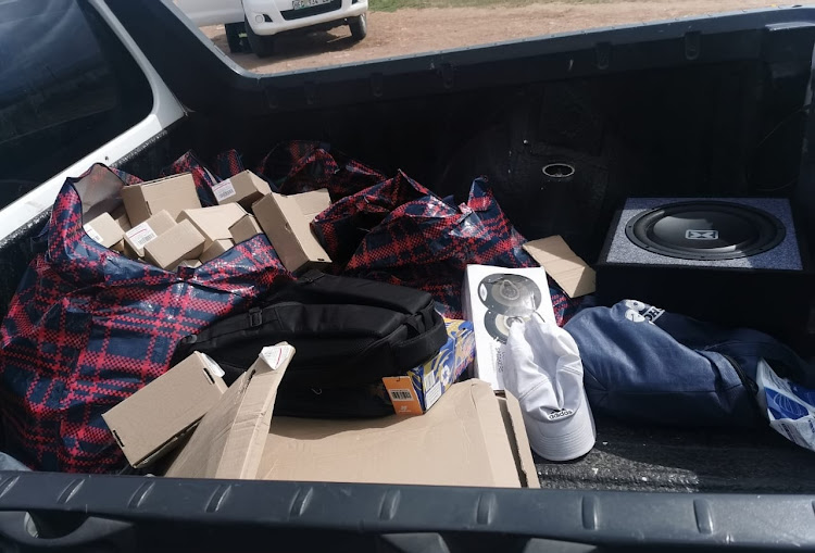 Police in Kareiga have arrested two suspects and recovered goods allegedly stolen during a robbery at the Corkwood Mall