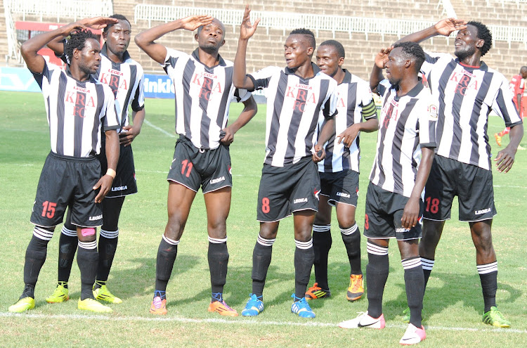 Geoffrey Kataka (L) with KRA team-mates in a past match against Ulinzi