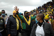 ANC president Cyril Ramaphosa greets ANC supporters at Intabazwe Community Stadium in Maluti A Phofung in the Free State where he is campaigning on Sunday.