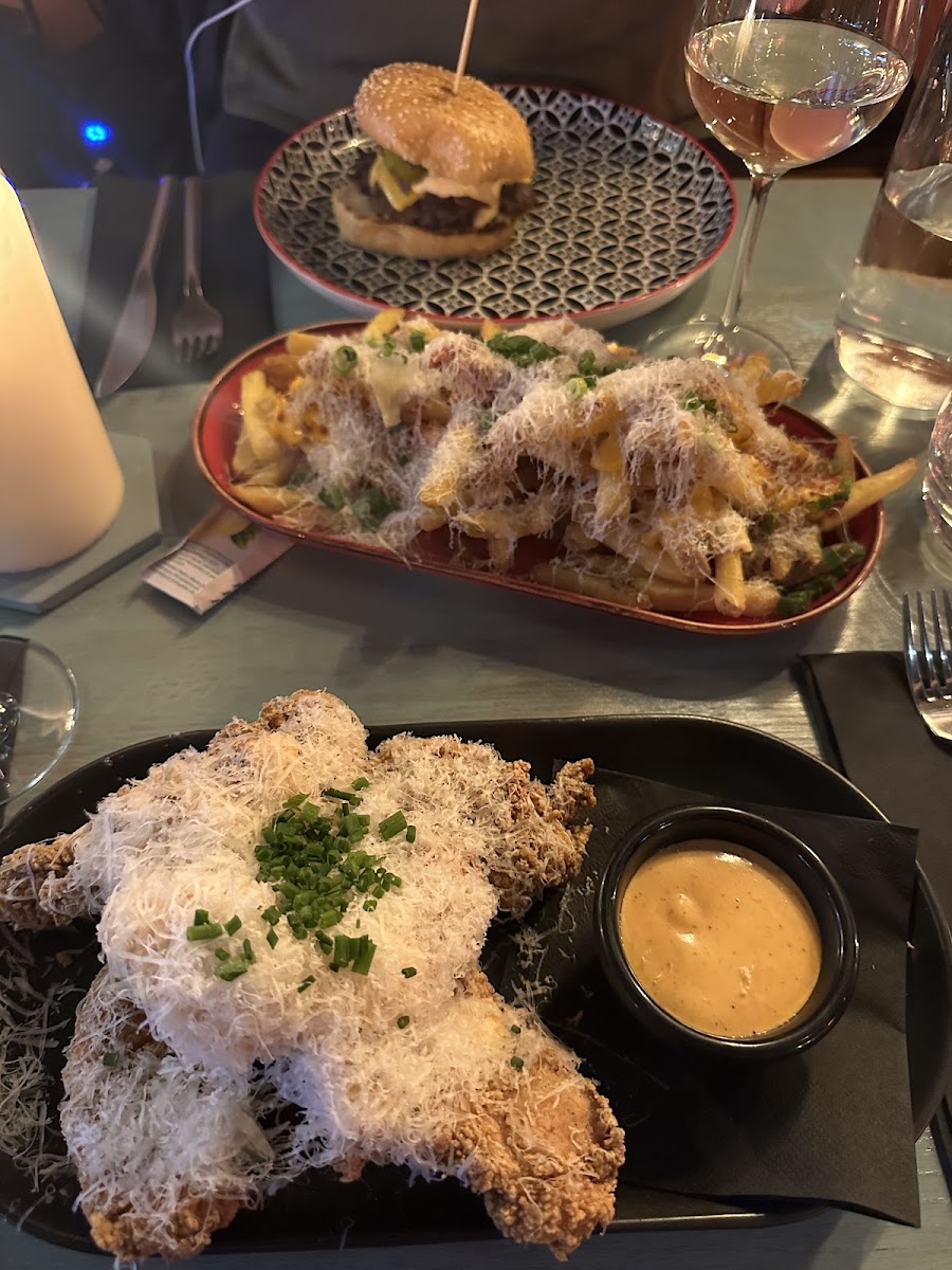 GF fried chicken tenders with Cajun rub, red pepper aioli  and Parmesan. 

Cheese Bacon Fries

**burger is not GF**