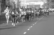 PACEY: Rene Kalmer, left, and Tabitha Tsatsa set the pace at the beginning of the Spa Women's 10km Challenge on Sunday. © Siyabonga Mosunkutu. © Sowetan.