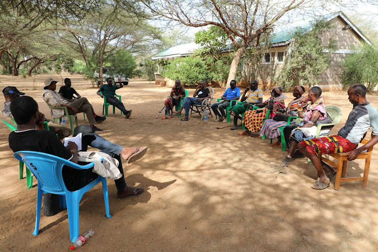 Northern Rangelands Trust (NRT) Trading livestock director Dr Wario Sake hosts a meeting with Seroilipi herders cluster group to sensitise them on the importance of getting veterinary expertise during drug administering.