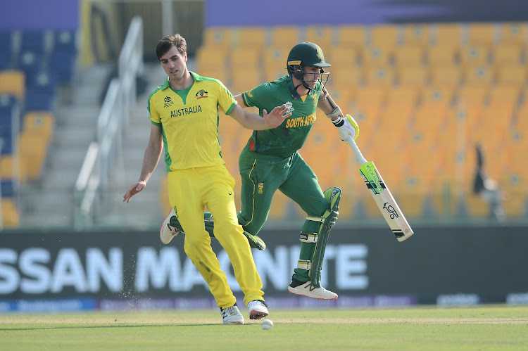 Anrich Nortje of the Proteas clashes with Pat Cummins of Australia during the 2021 ICC T20 World Cup match at Sheikh Zayed Stadium in Abu Dhabi, United Arab Emirates.