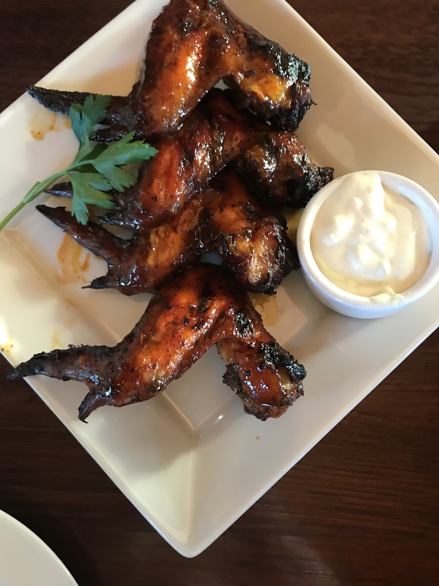 Woodfired Honey Buffalo Chicken Wings with a mild blue cheese sauce. Very smoky and delicious.