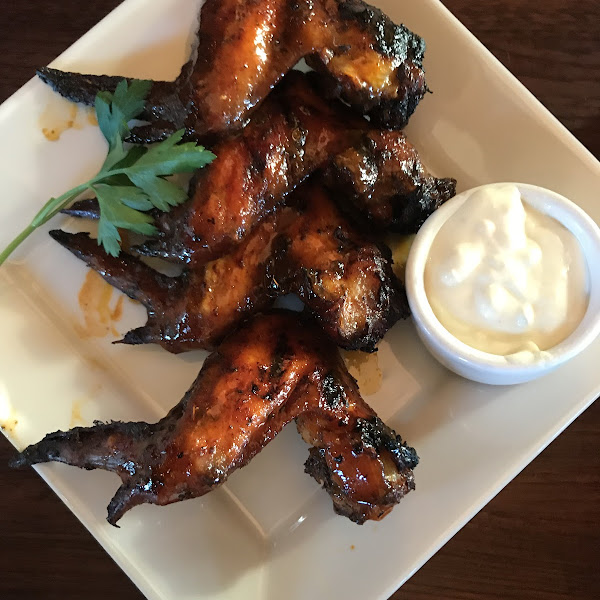 Woodfired Honey Buffalo Chicken Wings with a mild blue cheese sauce. Very smoky and delicious.