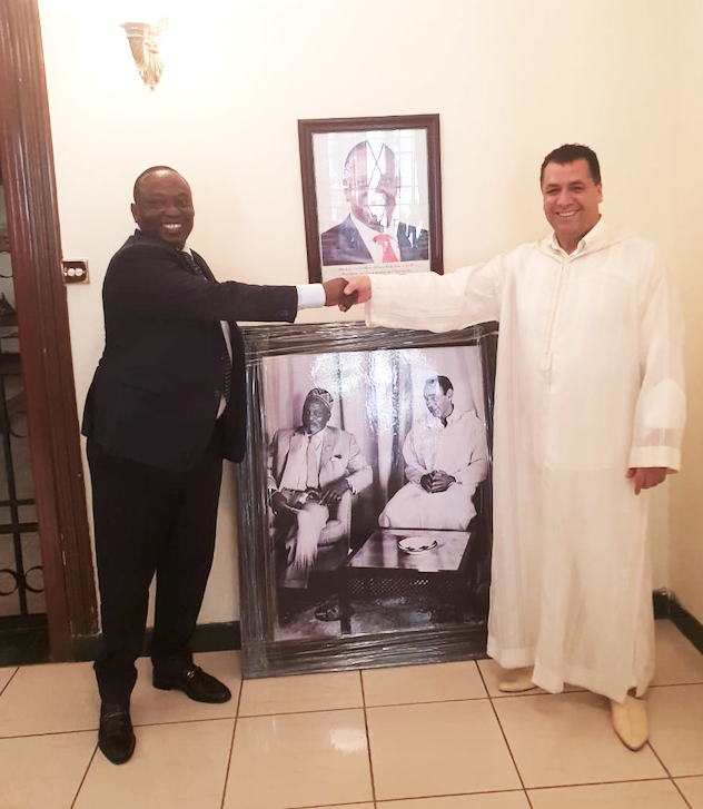 Moroccan Ambassador to Kenya Mokhtari Ghambou and the chairman of Kenya National Chamber of Commerce and Industry Nairobi Chapter Richard Ngatia at ambassador's official residence in Gigiri, Nairobi on Friday.