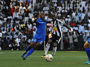 Siyabonga Nhlapho of Supersport United challenged by Adama Traore of TP Mazembe during 2017 CAF Confederations Cup Final Supersport United training at TP Mazembe Stadium in Stade Kamalondo DRC on 19 November 2017.