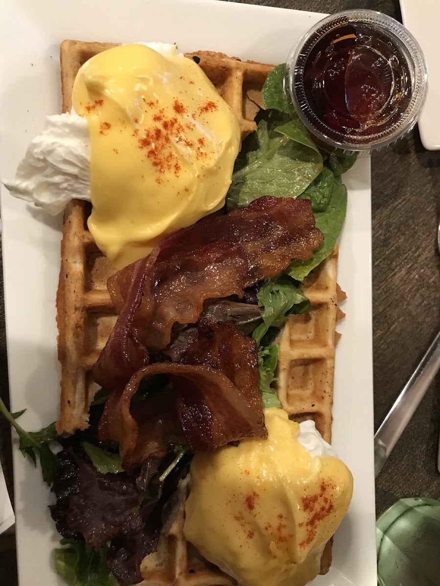 Eggs Benedict, with greens, waffles, and bacon.  This place ROCKS!!