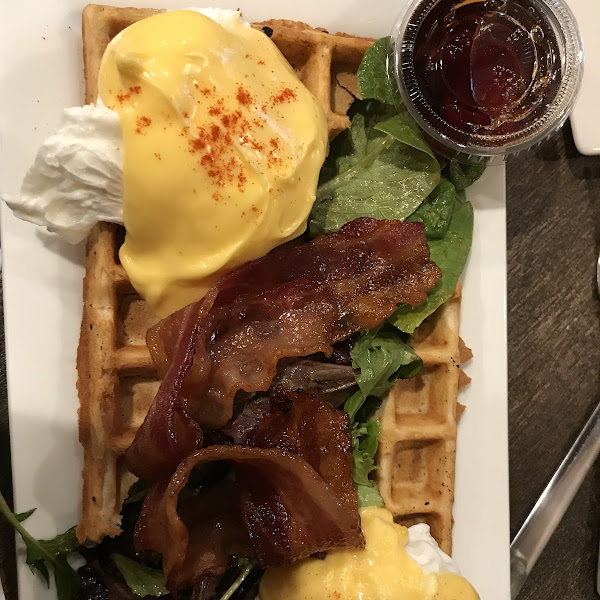 Eggs Benedict, with greens, waffles, and bacon.  This place ROCKS!!