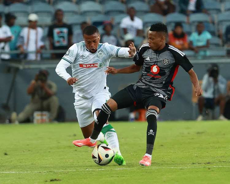 Thembela Sikhakhane of AmaZulu and Relebohile Ratomo of Orlando Pirates during their DStv Premiership match at Orlando Stadium on Saturday.