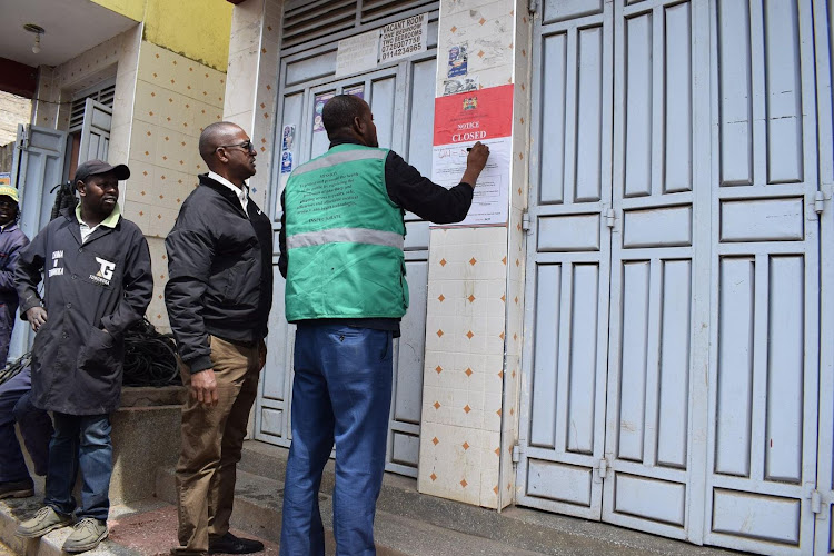 Officials from the Pharmacy and Poisons Board during an ongoing crackdown on illegal pharmacies in Nairobi and parts of Kajiado counties