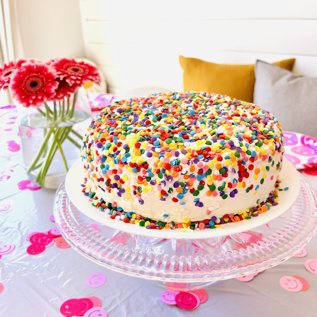 3 layer 9" Vanilla Cake with cherry filling, almond "buttercream" frosting, and sprinkles. Gluten, dairy, soy free.
