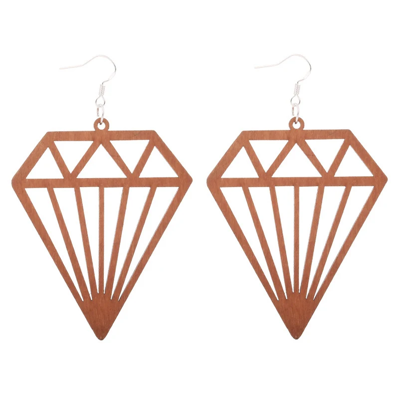 Pendientes de madera geométricos con patrón africano exagerado marrón. Elegancia artesanal, estilo audaz, perfectos para realzar tu look con un toque étnico.