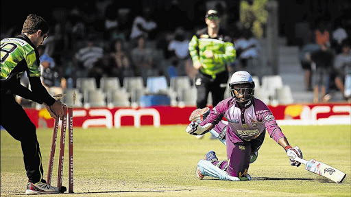 BACK TO THE SHEDS: The Warriors' Colin Ackermann runs out Titans batsman Mangaliso Mosehle during yesterday’s One Day Cup match at Buffalo Park Picture: MARK ANDREWS