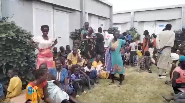 Locals gather at a UN peacekeeper camp following deadly attacks, in Dokura, Abyei region, January 28 2024. Picture: VIDEO OBTAINED BY REUTERS