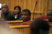 January 2017.  John   Lekubu , left, and his co-accused Eugene Machete, far right, appear in court for allegedly killing Keleabetse Seleka, who was kidnapped and later found dead. Pic: Sandile Ndlovu. © Sowetan