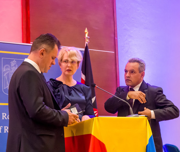 Romania's ambassador to Kenya Gentiana Serbu (center) with other top officials at Radisson Blue Hotel in Nairobi during celebrations to mark Romania independence day on December 1, 2023.