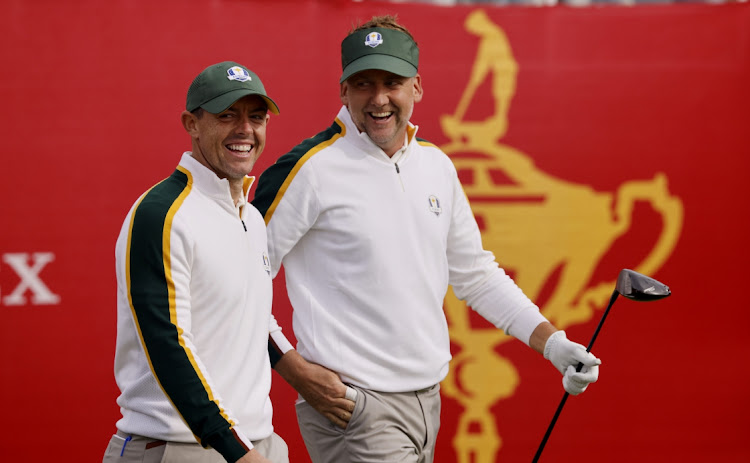 Team Europe's Rory McIlroy and Ian Poulter on the 1st tee during a practice round ahead of the 2020 Ryder Cup in Whistling Straits, Sheboygan, Wisconsin on September 22, 2021