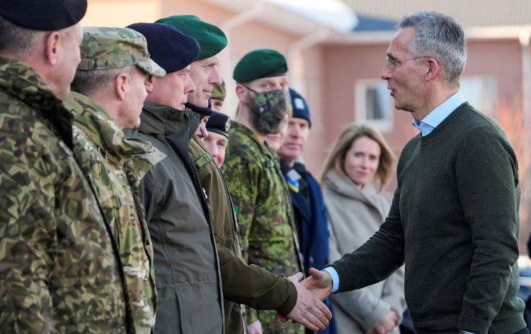 Nato secretary-general Jens Stoltenberg shakes hands with commander of the Estonian Defence Forces Lt-Gen Martin Herem in Tapa military base, Estonia, March 1 2022. Picture: REUTERS/Ints Kalnins