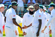 Kagiso Rabada of the Proteas glances back at the departing David Warner of Australia during day three of the second 2018 Sunfoil Test match between South Africa and Australia at St George's Park, Port Elizabeth on 11 March 2018.