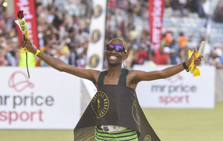 Tete Morena Dijana wins the men's race in the 2022 Comrades Marathon at Moses Mabhida Stadium in Durban on August 28 2022.