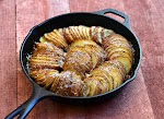 Hasselback Potatoes with Parmesan and Roasted Garlic was pinched from <a href="http://www.onionringsandthings.com/2013/09/hasselback-potatoes-with-parmesan-and-roasted-garlic/" target="_blank">www.onionringsandthings.com.</a>