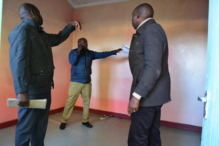 Uasin Gishu county officers inspecting houses at pioneer state on April 22nd 2023