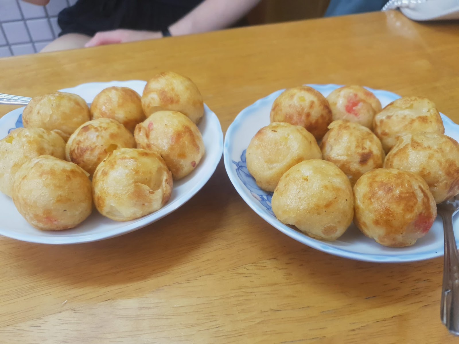 two plates of plain takoyaki at Takoyaki umaiya