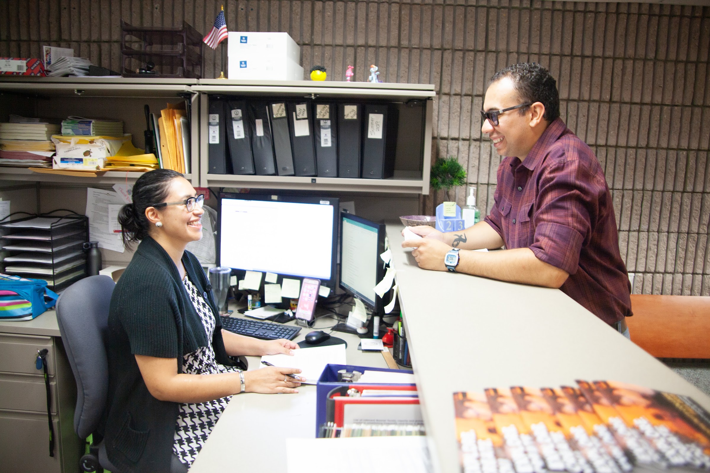 student being helped in Enrollment Services