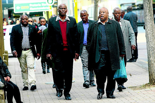 ROYALTY: King Makhosoke II of the Ndebele (with red jersey) at the North Gauteng High Court Photo: Veli Nhlapo