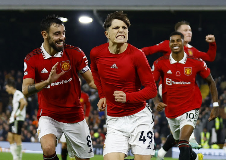 Manchester United’s Alejandro Garnacho celebrates scoring their second goal against Fulham with Bruno Fernandes in London, Britain, November 13 2022. Picture: ANDREW BOYERS/ACTION IMAGES/REUTERS