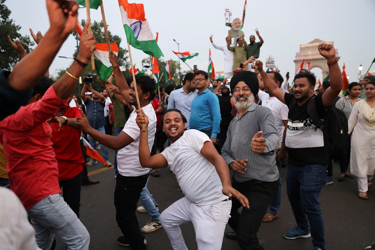 People celebrate the Chandrayaan-3 spacecraft's landing, in New Delhi, India, August 23 2023. Picture: ANUSHREE FADNAVIS/REUTERS