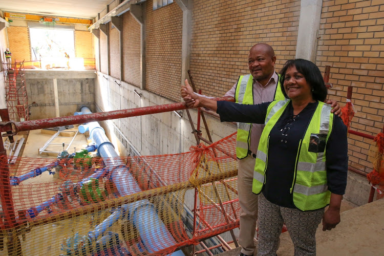 Water and sanitation minister Senzo Mchunu, on a visit to Nelson Mandela Bay on Monday, activated the recently completed KwaNobuhle Pump Station at the Chelsea reservoir, which will pump water from the Nooitgedacht scheme to the western parts of the city, which are expected to run out of water first. With him is Bay mayor Eugene Johnson. Picture: WERNER HILLS