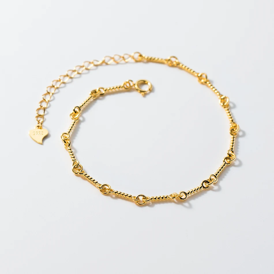 Bracelet S925 en argent sterling avec boucle torsadée haut de gamme. Élégance intemporelle et qualité supérieure. Un bijou parfait pour tous les jours.