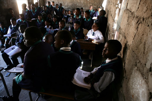 Overcrowded classroom shared by grade 8 and 9 at Sekete Secondary School in Kanana village outside Polokwane. The residents has erected this extra class to accomodate learners. Photo: SANDILE NDLOVU