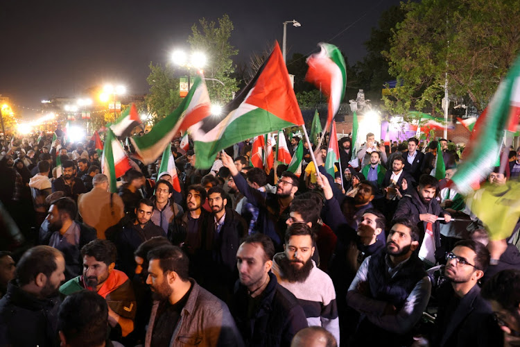 Iranian demonstrators attend an anti-Israeli gathering in front of the British embassy in Tehran, Iran, April 14 2024. Picture: Majid Asgaripour/WANA /REUTERS