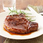 Lemon-Raspberry Glazed Pork Chops was pinched from <a href="http://www.eatingwell.com/recipe/259498/lemon-raspberry-glazed-pork-chops/" target="_blank" rel="noopener">www.eatingwell.com.</a>