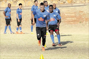 HARD WORK: 
      
          George Lebese, left, leads Bafana Bafana training at Marks Park yesterday ahead of Friday's Africa Cup of Nations qualifier away to Sudan 
      PHOTO: Veli Nhlapo