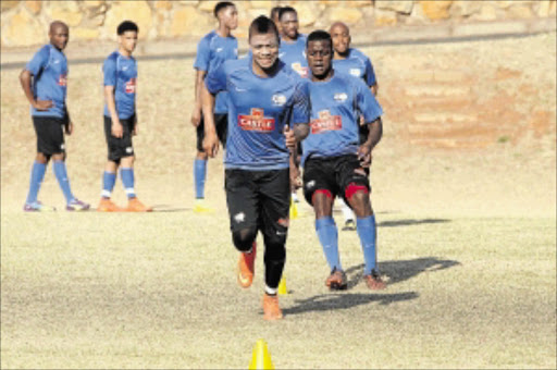 HARD WORK: George Lebese, left, leads Bafana Bafana training at Marks Park yesterday ahead of Friday's Africa Cup of Nations qualifier away to Sudan PHOTO: Veli Nhlapo