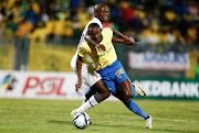 Peter Shalulile of Mamelodi Sundowns in action with Tshepang Makara of AmaTuks in the Nedbank Cup on Friday.