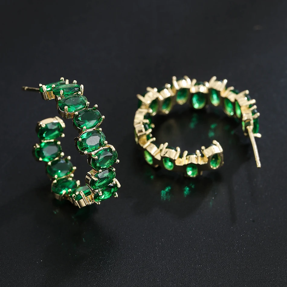 Boucles d'oreilles pendantes en forme de C avec zirconiums exagérés pour femmes, design tempérament, élégance assurée.