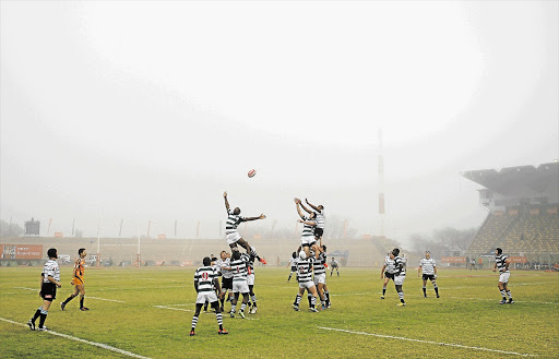 Teams fight for the ball in misty conditions during the first day of the Under-18 Craven Week at the Old Peter Mokaba Stadium in Polokwane yesterday