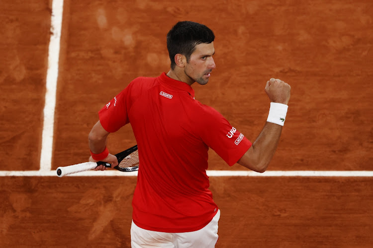 Novak Djokovic of Serbia celebrates during the fourth round against Karen Khachanov of Russia on day nine of the French Open at Roland Garros on October 5, 2020 in Paris