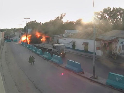 A video grab taken from a Somali Police CCTV, date shot May 24, 2017, shows the moment a car explodes near the Mogadishu sea port in Somalia. Somali Police./ REUTERS