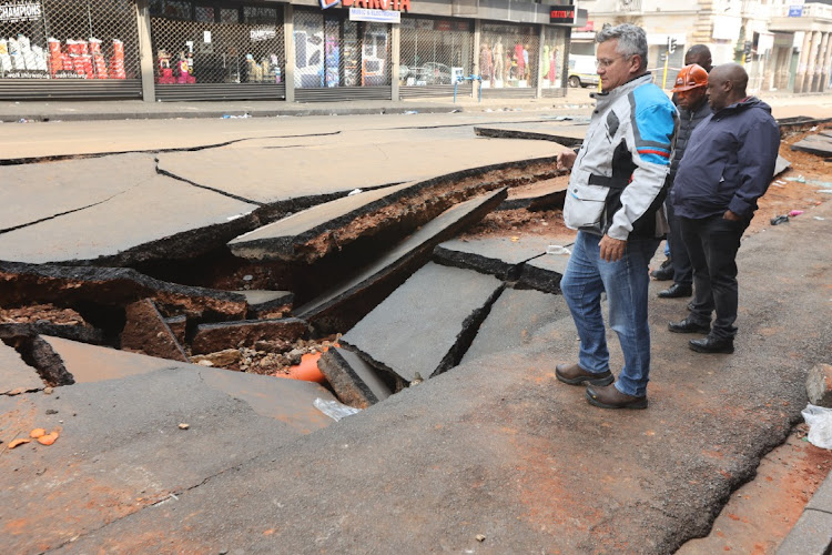 Engineers assess the damage on Lilian Ngoyi (Bree) Street. File photo.