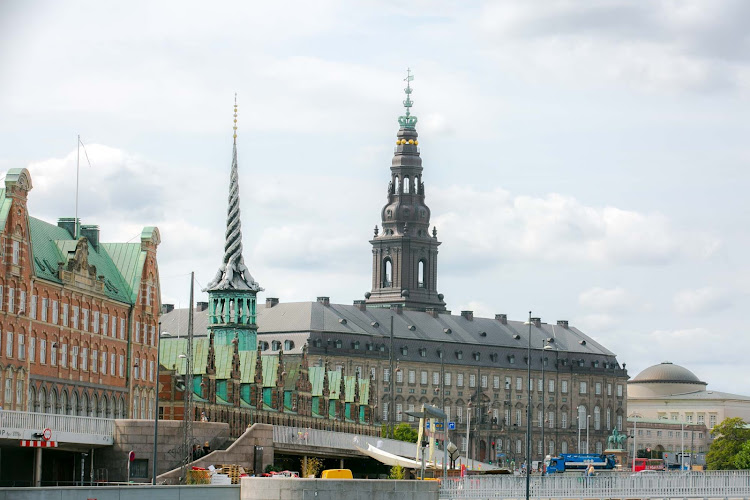  Visit Christiansborg Palace, seat of the Danish Parliament, on the island of Slotsholmen in central Copenhagen.