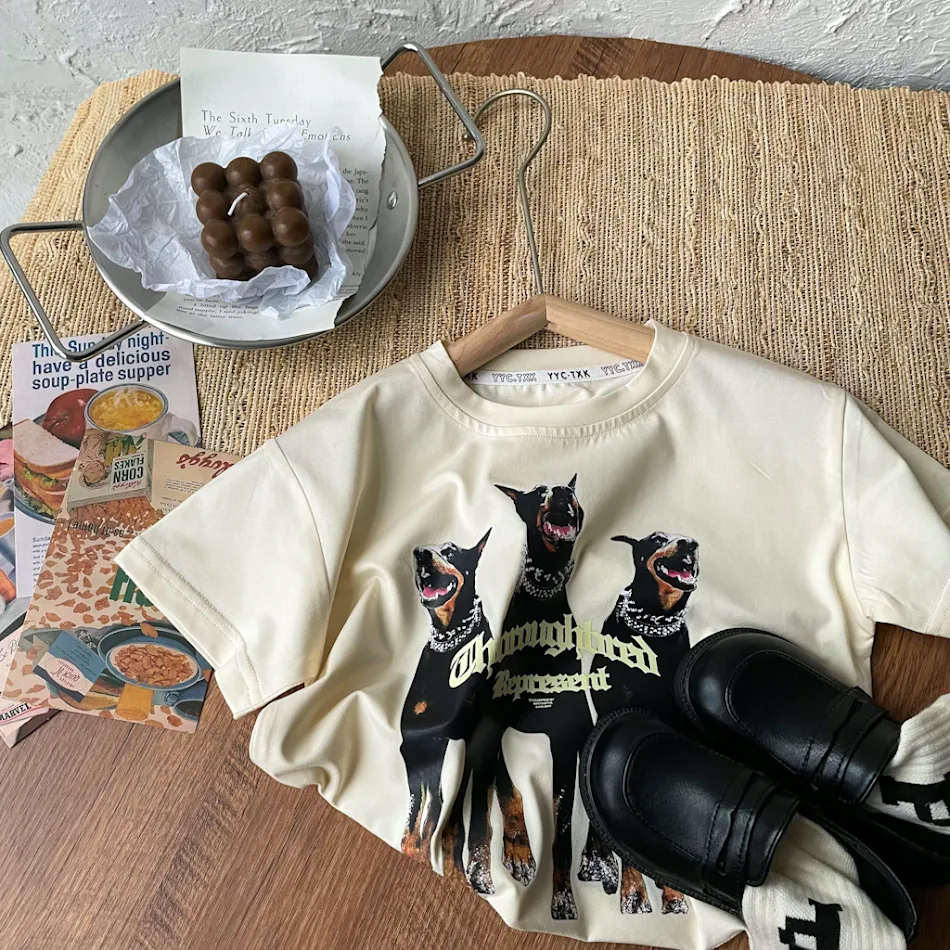 Boys' trendy Doberman Pinscher t-shirt, a casual and comfortable everyday essential. Perfect for stylish kids, providing