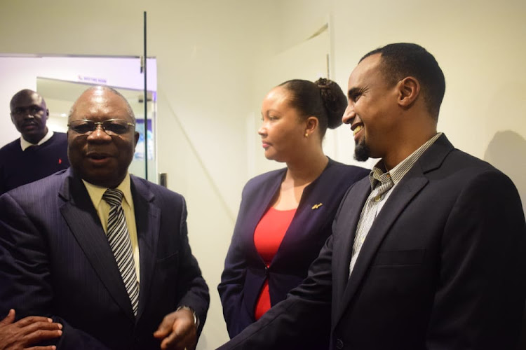 High Commissioner of South Africa, H.E MJ Mahlangu on the left with other attendees at the event