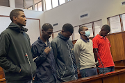 Sihle Mkhize, Siyabonga Mahaye, Kwanele Makhaye, Siyabonga Mkhize and Thobani Mhlongo appear in the Durban magistrate's court in connection with the murder of MUT electrical engineering lecturer Shan Dwarika. Charges against Mkhize were withdrawn. File photo.